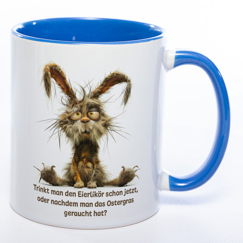 Motiv - Tasse mit Spruch und Hase: Trinkt man den Eierlikör schon jetzt, oder nachdem man das Ostergras geraucht hat? spülmaschinenfest