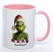 Zum Wichteln oder zu Nikolaus: Kaffeetasse Grinch mit Bild und Text: Naughty! mit Wunschname in der Farbe pink